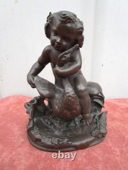 Statuette of a Cherub Holding a Goose, 19th century, bronze