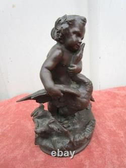 Statuette of a Cherub Holding a Goose, 19th century, bronze