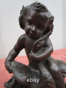 Statuette of a Cherub Holding a Goose, 19th century, bronze