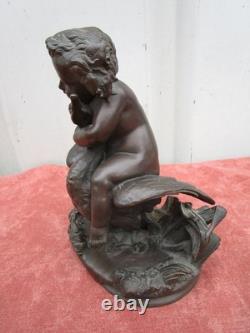 Statuette of a Cherub Holding a Goose, 19th century, bronze