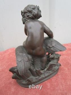 Statuette of a Cherub Holding a Goose, 19th century, bronze