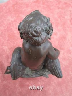 Statuette of a Cherub Holding a Goose, 19th century, bronze
