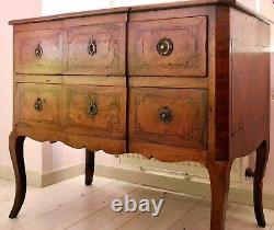 Transition period walnut and marquetry commode with projecting front