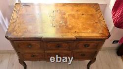 Transition period walnut and marquetry commode with projecting front