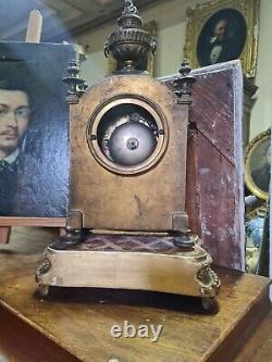 Translation: Antique Bronze Clock in Louis XVI Style, Gilded Wooden Base, Late 19th Century