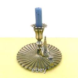 Translation: Large handheld candlestick and its snuffer, silver-plated (brass) from the 19th century.