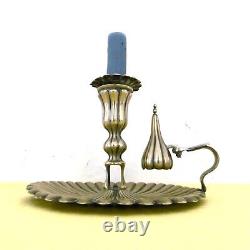 Translation: Large handheld candlestick and its snuffer, silver-plated (brass) from the 19th century.