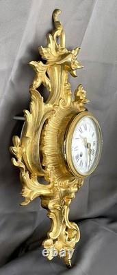 Very beautiful wall-mounted cartel in Louis XV style in gilded bronze, 19th century period