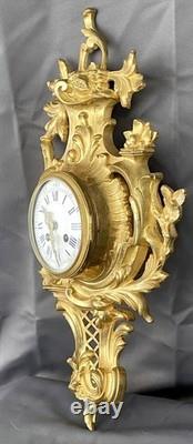 Very beautiful wall-mounted cartel in Louis XV style in gilded bronze, 19th century period