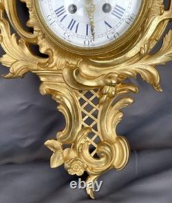 Very beautiful wall-mounted cartel in Louis XV style in gilded bronze, 19th century period