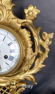 Very beautiful wall-mounted cartel in Louis XV style in gilded bronze, 19th century period
