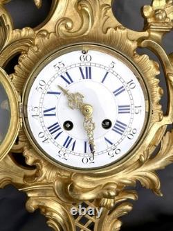 Very beautiful wall-mounted cartel in Louis XV style in gilded bronze, 19th century period