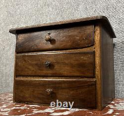 Watchmaker's cabinet / compartmentalized walnut chest from the 19th century