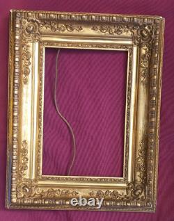 Wood and gilded stucco key frame from the 19th century