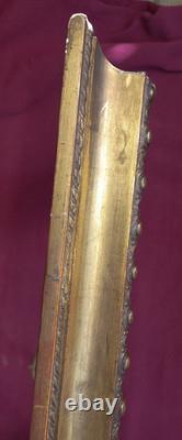 Wood and gilded stucco key frame from the 19th century