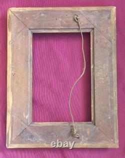 Wood and gilded stucco key frame from the 19th century