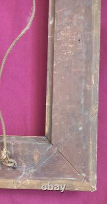 Wood and gilded stucco key frame from the 19th century