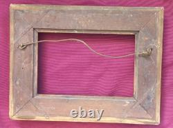 Wood and gilded stucco key frame from the 19th century