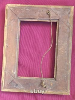 Wood and gilded stucco key frame from the 19th century