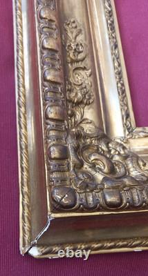 Wood and gilded stucco key frame from the 19th century
