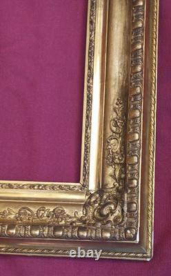 Wood and gilded stucco key frame from the 19th century