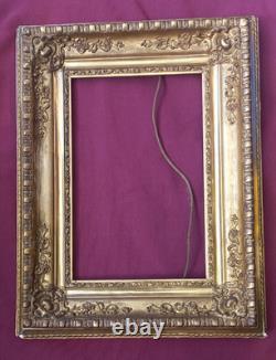 Wood and gilded stucco key frame from the 19th century
