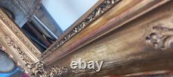 Wood and gilded stucco key frame from the 19th century