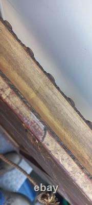 Wood and gilded stucco key frame from the 19th century