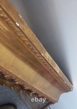 Wood and gilded stucco key frame from the 19th century