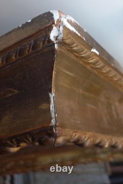 Wood and gilded stucco key frame from the 19th century