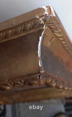 Wood and gilded stucco key frame from the 19th century
