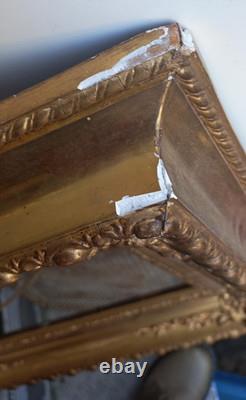 Wood and gilded stucco key frame from the 19th century
