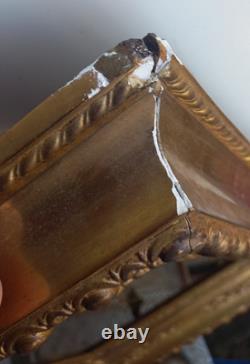 Wood and gilded stucco key frame from the 19th century