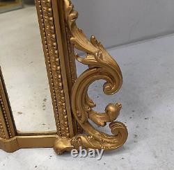 Wood and stucco mirror from the Napoleon III period, 19th century.