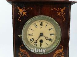 Ancienne horloge en marqueterie époque XIX ème s