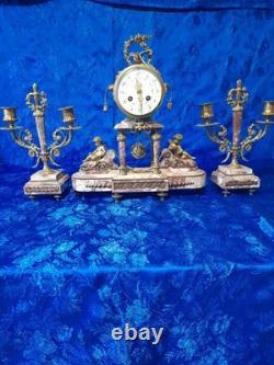 Ancienne pendule en bronze a décors d'angelots époque fin 19é début 20é louis16