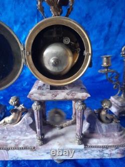 Ancienne pendule en bronze a décors d'angelots époque fin 19é début 20é louis16