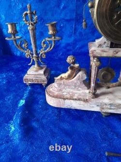 Ancienne pendule en bronze a décors d'angelots époque fin 19é début 20é louis16