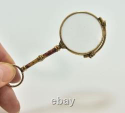 Binocle ou face à main en or et émail d'époque XIXème