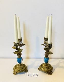 Bougeoirs / chandeliers époque XIXe en bronze doré massif, fûts en porcelaines