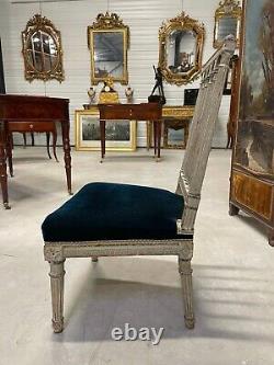 Chaise basse peinte époque Louis XVI