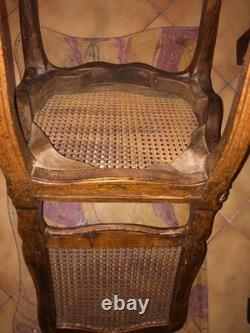 Chaise cannée Louis XV en hêtre scuplté. France, époque XVIIIe