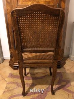 Chaise cannée Louis XV en hêtre scuplté. France, époque XVIIIe