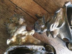 Chenets en bronze à décor de Putti, époque XIXème à nettoyer poids 9,4 kg