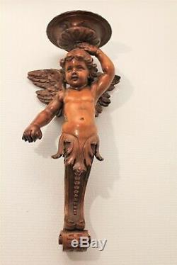 Console d'applique en bois sculpté représentant un ange époque XIX ème siècle