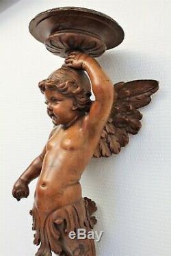 Console d'applique en bois sculpté représentant un ange époque XIX ème siècle
