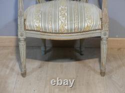 Fauteuil de style Louis XVI en bois sculpté et laqué, époque XIX ème siècle