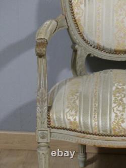 Fauteuil de style Louis XVI en bois sculpté et laqué, époque XIX ème siècle