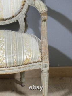 Fauteuil de style Louis XVI en bois sculpté et laqué, époque XIX ème siècle