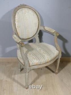 Fauteuil de style Louis XVI en bois sculpté et laqué, époque XIX ème siècle